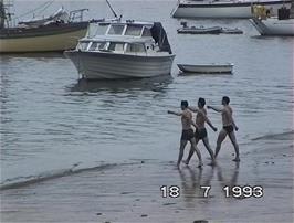 What exactly are these three doing on East Portlemouth Beach?